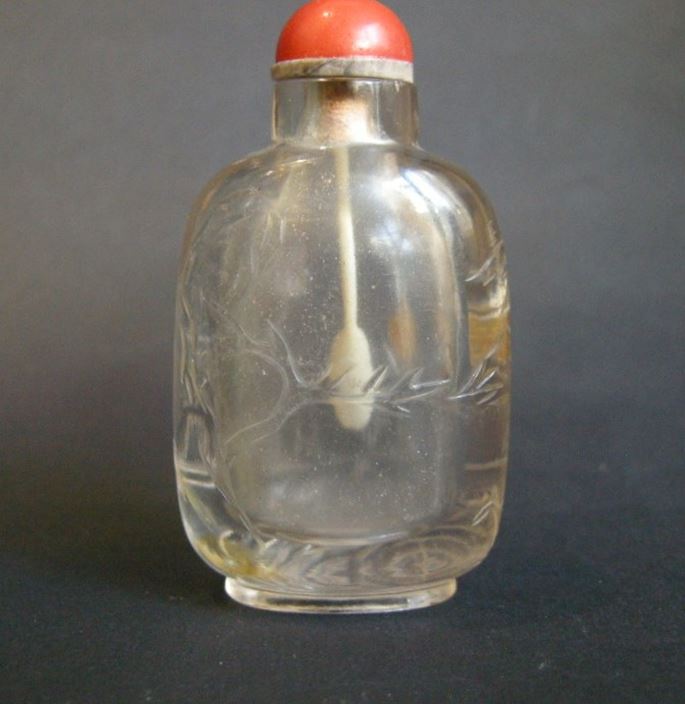Snuff bottle rock Crystal sculpted with lanscape and a figure on a boat (sampan) | MasterArt